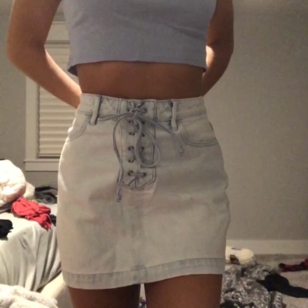 Denim skirt laced up in the front.